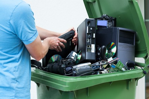 Team managing garden waste removal in Highgate